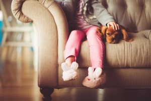 Dog and child on couch